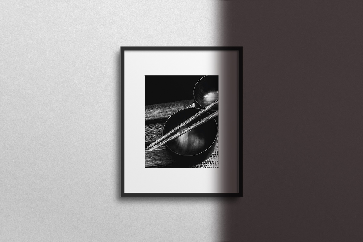 Black & White photo frame of a bowl and chopstic with black border